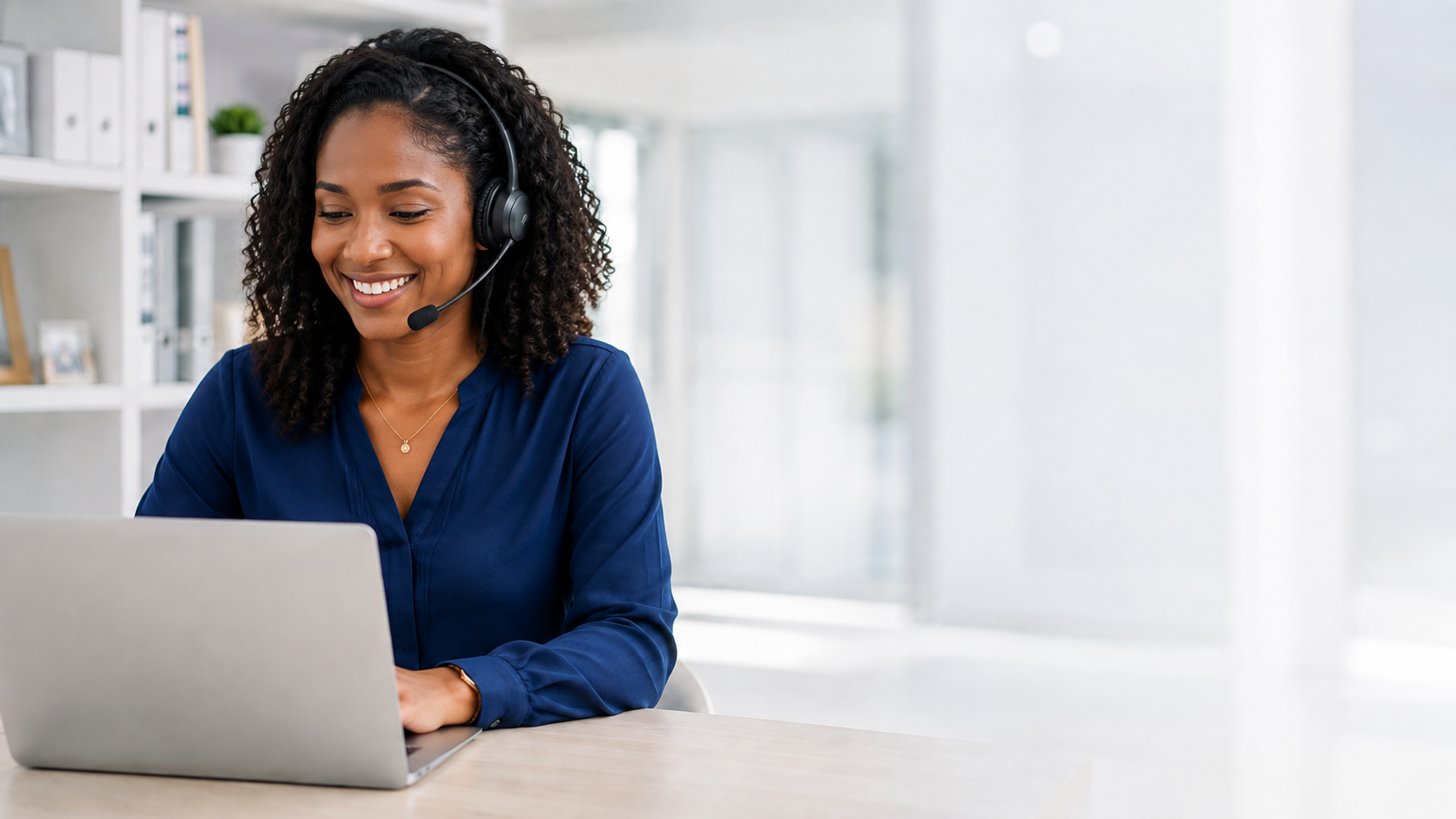 Virtual assistant working at a laptop